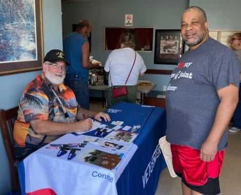 Vet Center employee helping LP2 resident