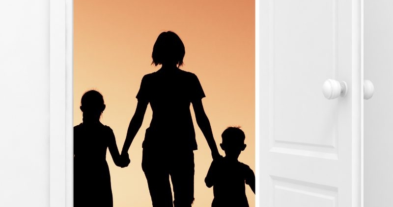 Image of a doorway with a mother and children on the other side